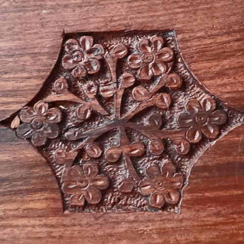 Vintage wooden serving tray used with carved floral motif