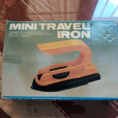 Mini travel iron 1980s, new