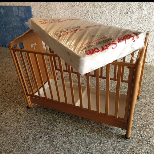 Wooden cot with mattress like new, barely used