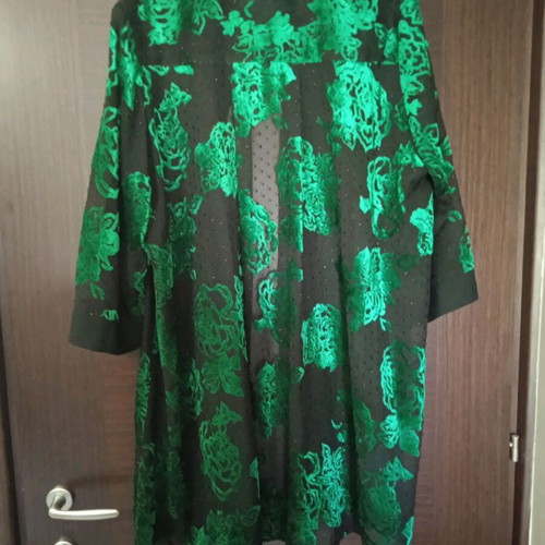 Women's tunic like new, black with green flowers