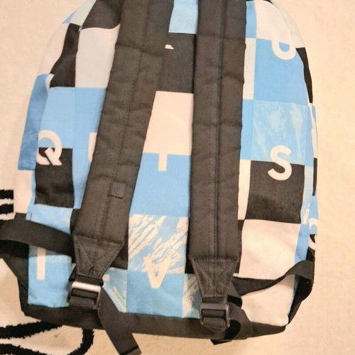 Collectible Quicksilver blue checkered school bag, with slight wear on the front pocket. Unique
