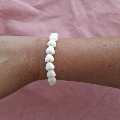 Bracelet with cream heart beads on elastic cord made to order