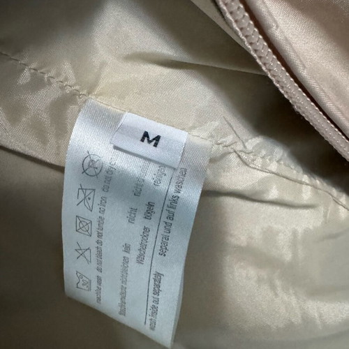 Lightweight waterproof jacket used, beige with hood, size M