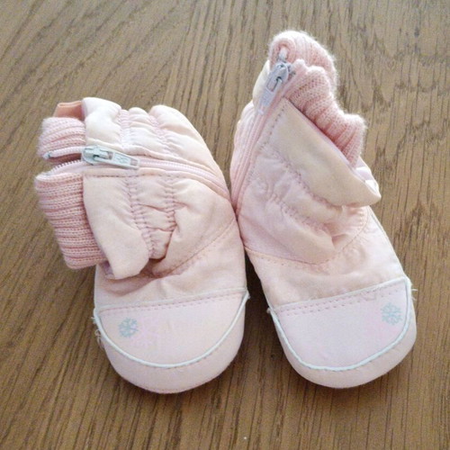 Pink baby booties with fleece lining