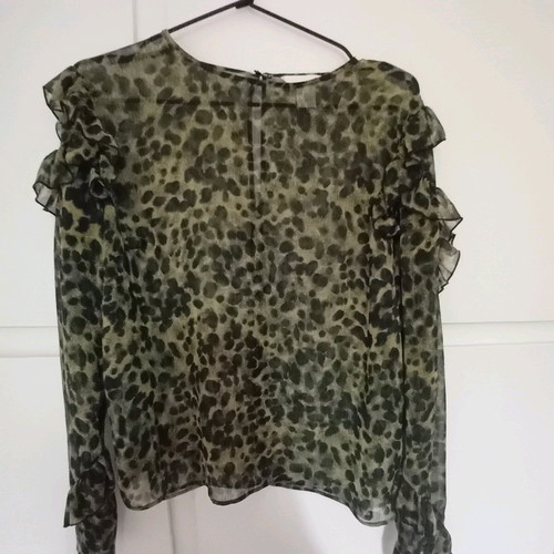 H&M blouse like new, size 38, with transparency and ruffles on sleeves