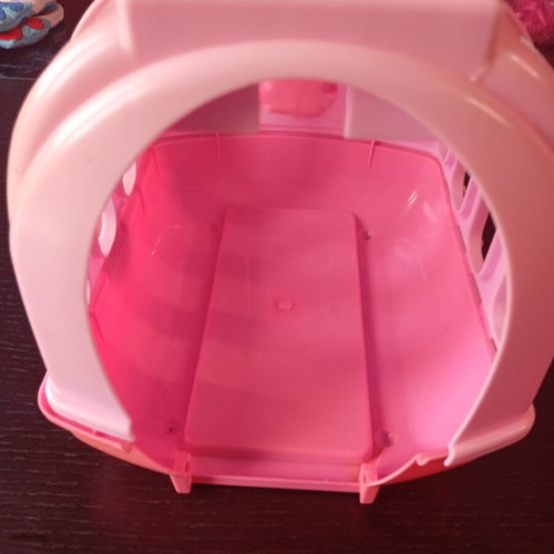 Pink plastic carrier cage for plush animals like new