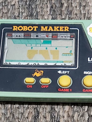 Electronic game LCD Robot Maker used, 1980s