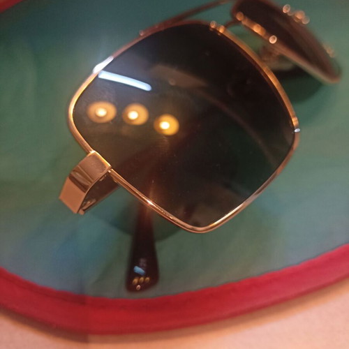 Invu sunglasses like new, gold color