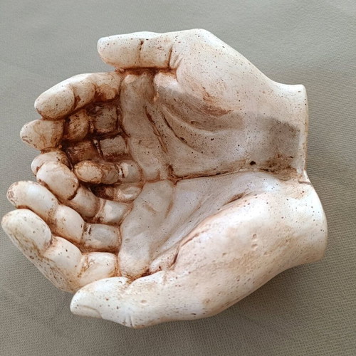 Decorative hands new, handmade art with candle heart rose