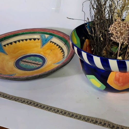 Mexican style ceramic plate and vase with plant composition used