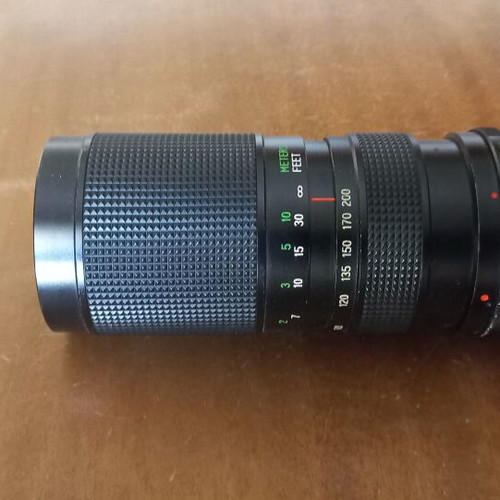 Soligor MD-EOS Telephoto Zoom Lens used, focus 0 to 200m