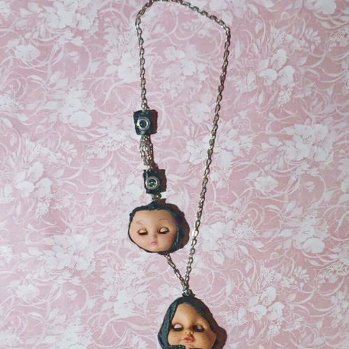 Gothic handmade necklace custom made with old doll heads