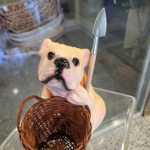 Decorative dog figure with basket