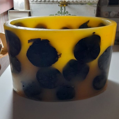 Handmade decorative candle like new, yellow and black design