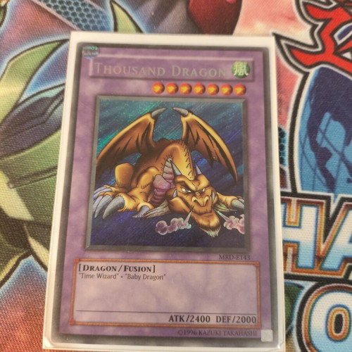 Thousand Dragon Yu-Gi-Oh card used, Secret Rare, MRD edition, damaged