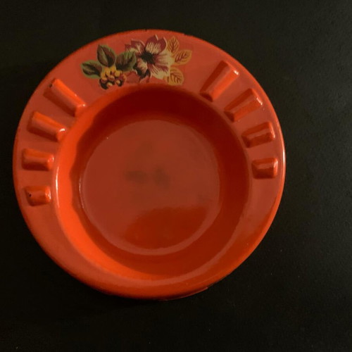 Vintage orange glass ashtray used