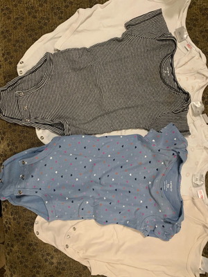 Short-sleeve baby bodysuits used, pack of 6 for up to 9 months