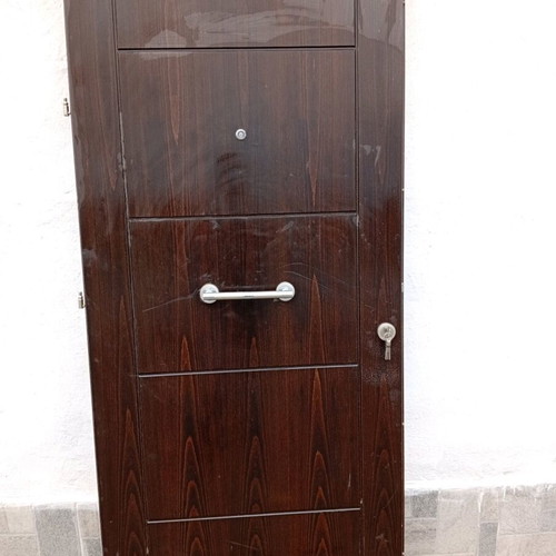 Entrance door used 2.15x0.94 solid wood with security lock