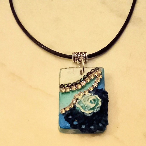Handmade necklace new with blue and white details