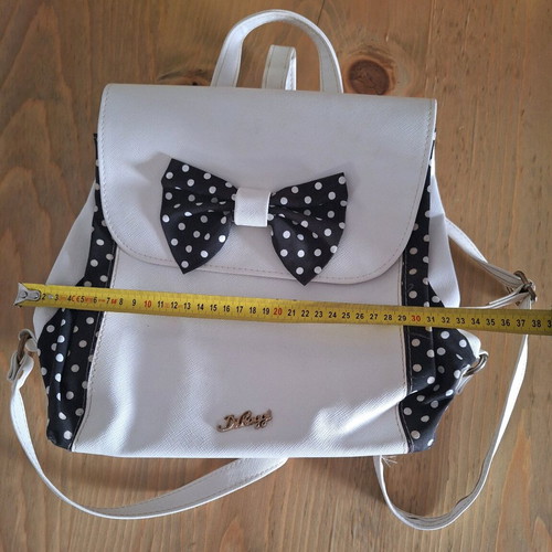 D. Raggi backpack with bow and polka dot details, like new