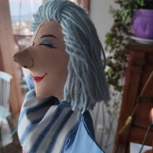 Handmade doll for collectors or puppet theatre on wooden base