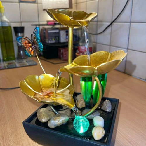 Indoor fountain with LED lighting and stones