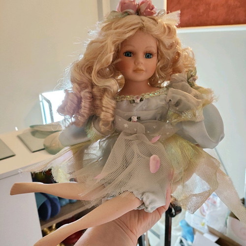 Porcelain fairy doll like new
