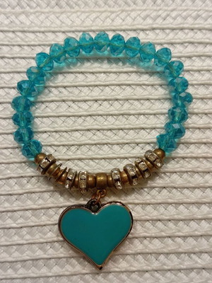 Women's bracelet like new, turquoise with elastic base