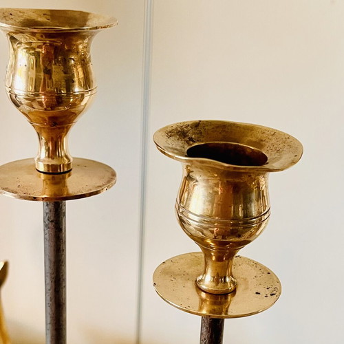 Vintage brass candlesticks with thin iron stems used