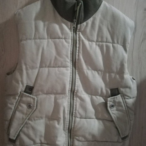 Children's sleeveless beige jacket like new for ages 10-12