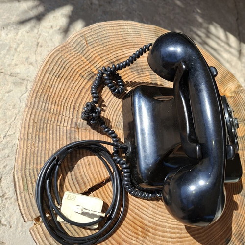 Collectible old-style telephone used, black, functional