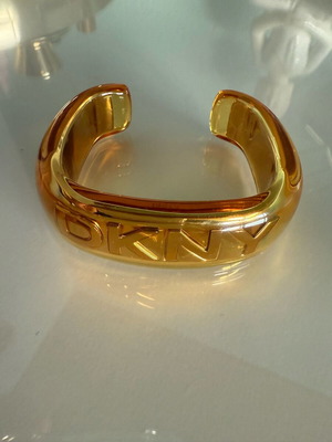 DKNY bracelet new plastic and steel yellow-gold