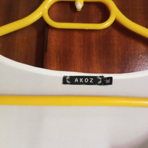 White airy long shirt with V neckline