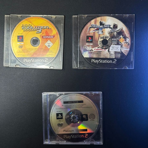PlayStation 2 games pack used, Max Payne, Soul Calibur 3, PES 3 discs