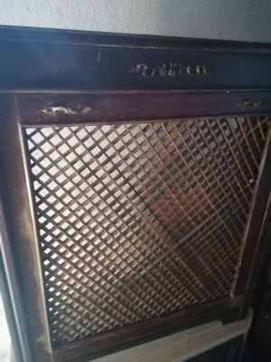 Etagere used with mahogany radiator cover from 1955