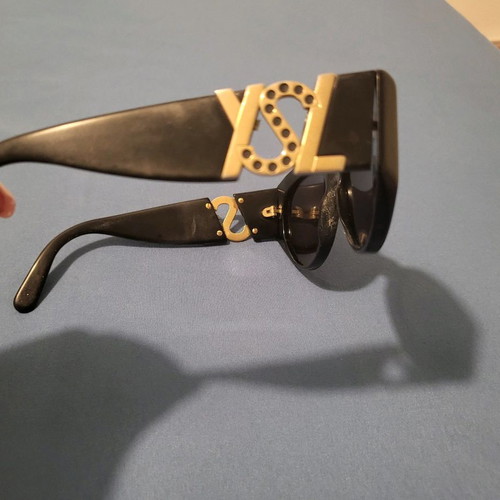 Yves Saint Laurent sunglasses used, black with gold logo