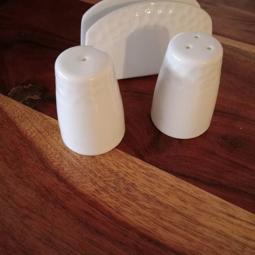 Porcelain salt and pepper set with napkin holder like new