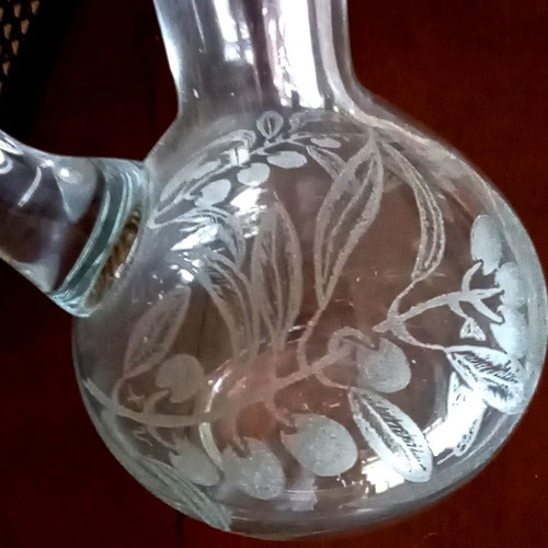 Handmade oil and vinegar set with carved glass bottles and wooden base