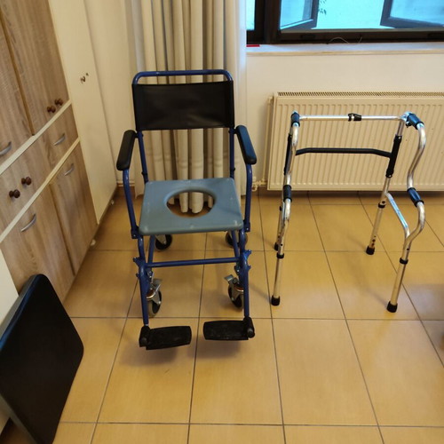 Mobility wheelchair with toilet function