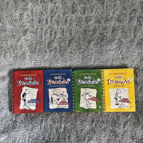 Diary of a Wimpy Kid 4 books used in excellent condition