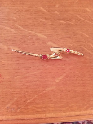 Vintage lightning bolt brooch with red stones, like new