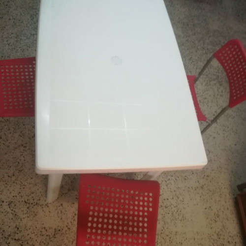 Plastic veranda table used, 100x66x73 cm