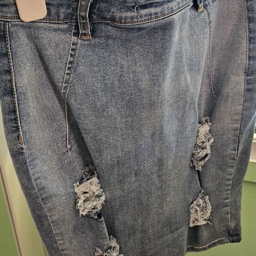 Denim pencil skirt new with modern rips and faded blue color, size S