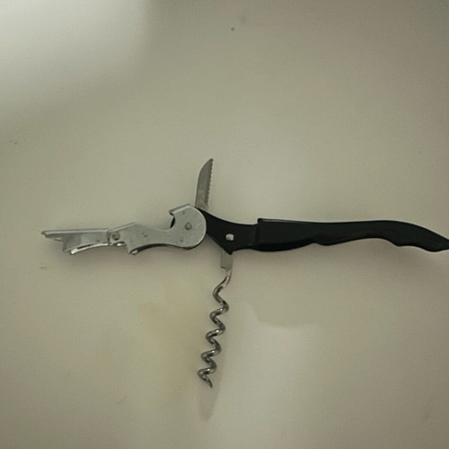 Bottle opener like new for wine, beer, and soft drinks