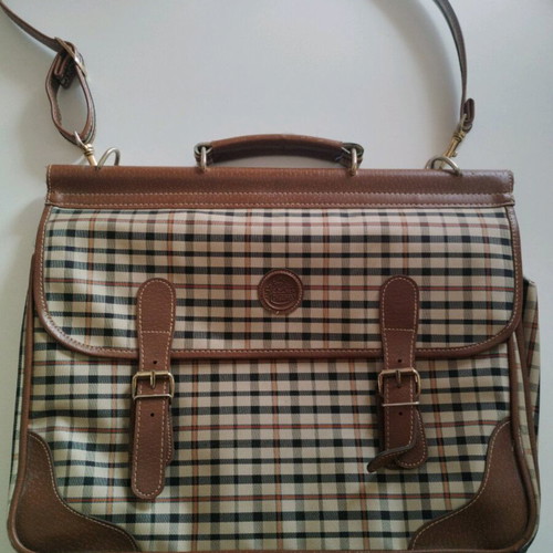 Vintage briefcase like new with small internal stain