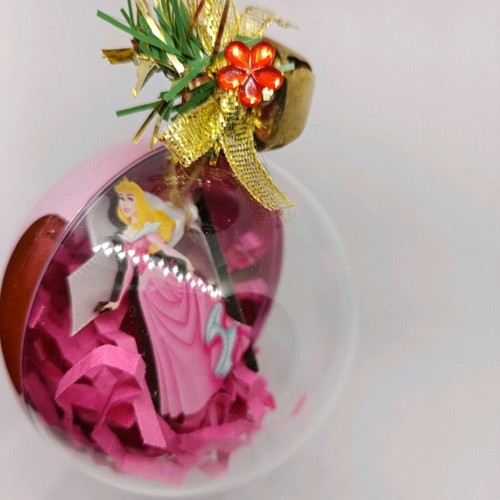Earrings inside Christmas ball ornament like new