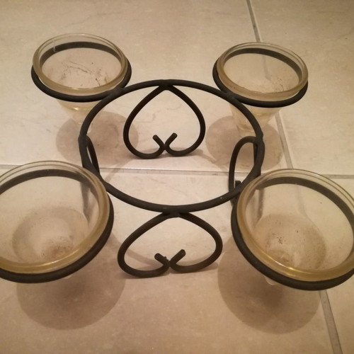 Metal candle holder used for four tealight candles