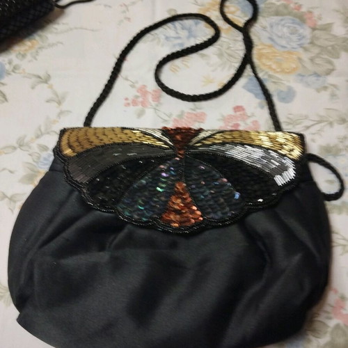 Satin shoulder bag like new with embroidered details black