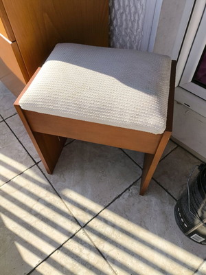 Wooden stool used with fabric seat