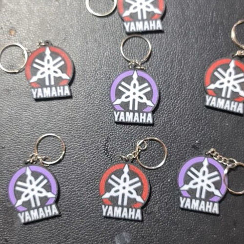Yamaha keychain with red and purple logo
